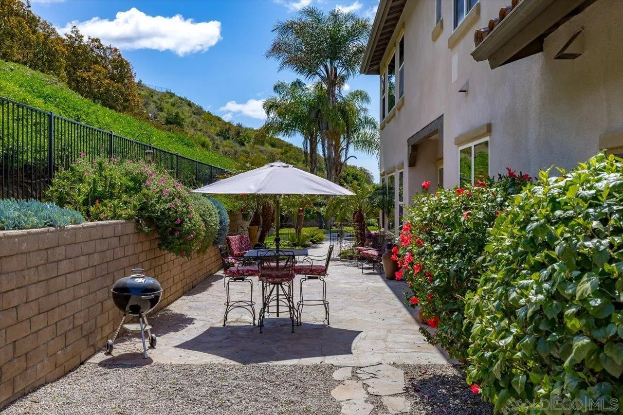 1505 Chateau Lafite Bonsall, CA 92003 - Photo 37 of 47 a garden view with a seating space