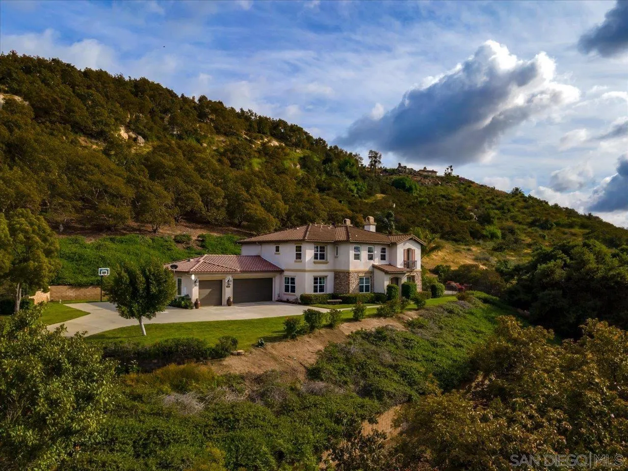 1505 Chateau Lafite Bonsall, CA 92003 - Photo 39 of 47 an aerial view of a house with a big yard