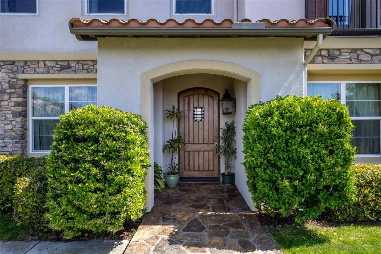 1505 Chateau Lafite Bonsall, CA 92003 - Photo 6 of 47 a front view of a house
