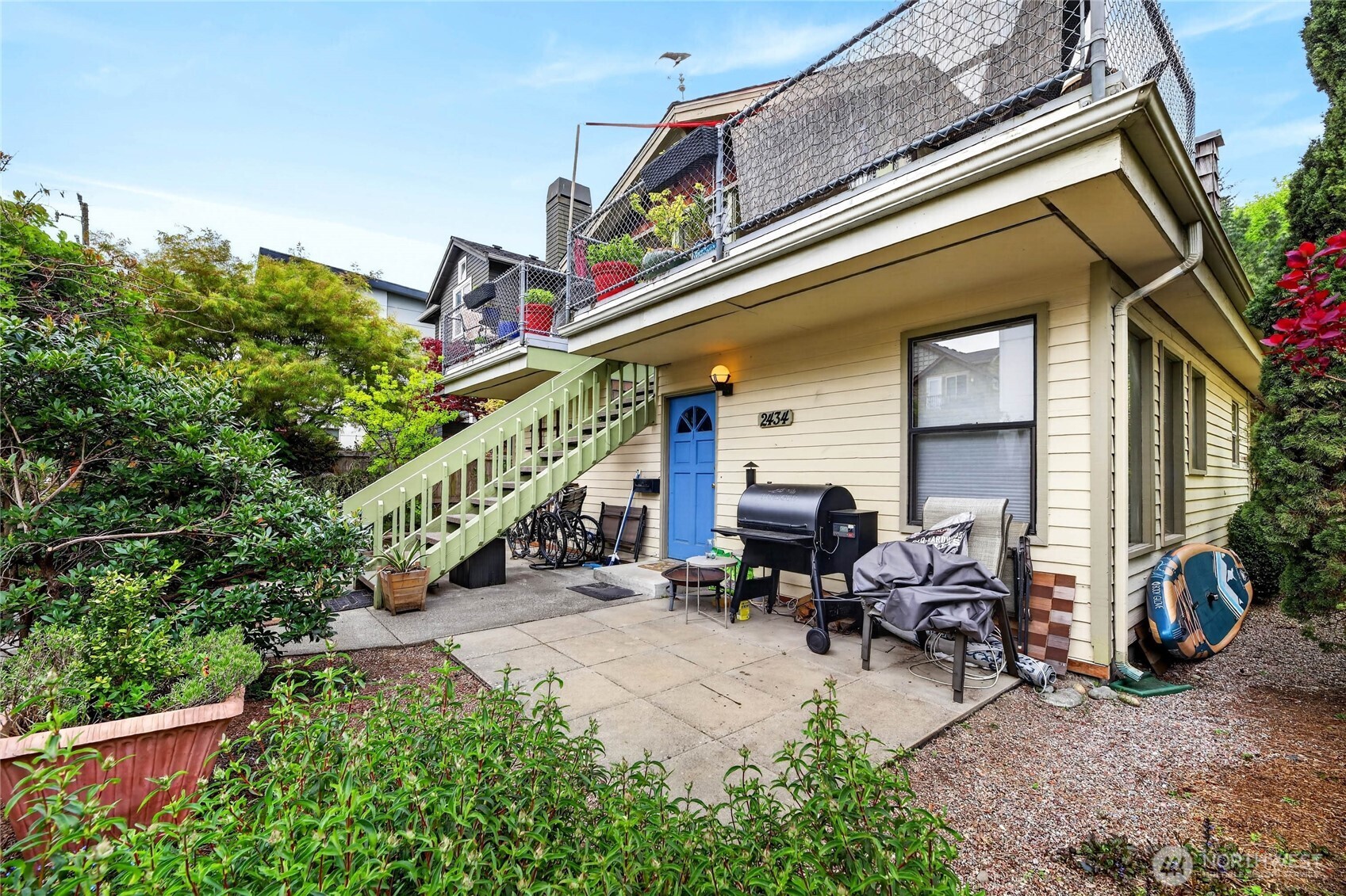 2434 55th Avenue Southwest Seattle, WA 98116 - Photo 14 of 40 a view of a building with sitting area