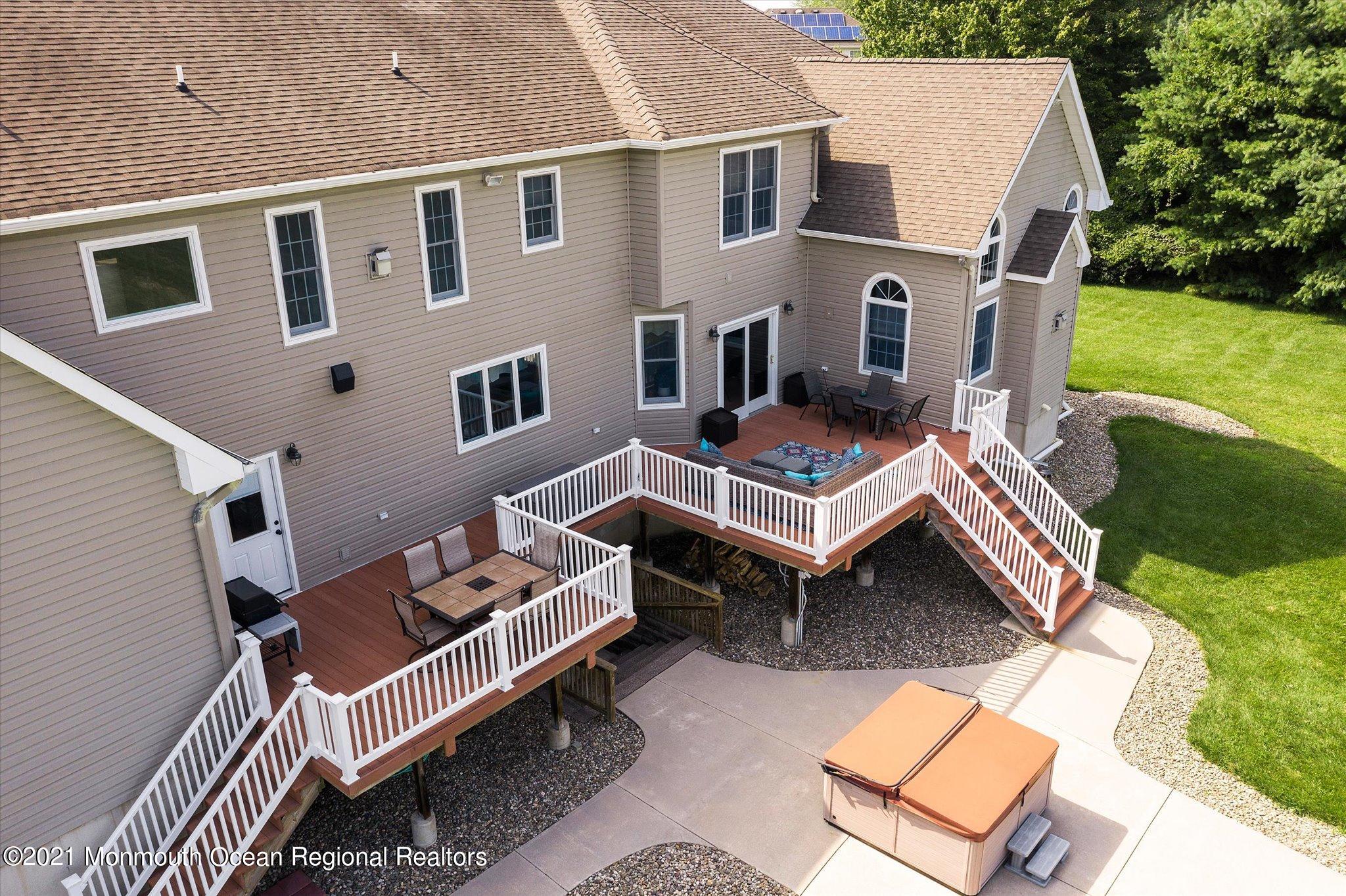 58 Folwell Station Road Jobstown, NJ 08041 - Photo 44 of 44 a backyard of a house with table and chairs