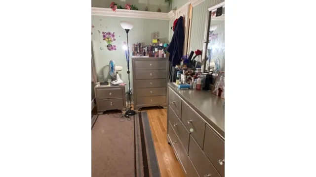 a view of a hallway with white walls