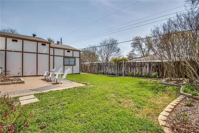 a view of a backyard with a garden