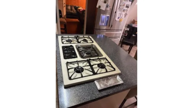 a kitchen with a white cabinets and white appliances