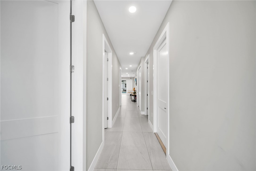26951 North Riverside Drive Bonita Springs, FL 34135 - Photo 6 of 50 a view of a hallway with a white walls