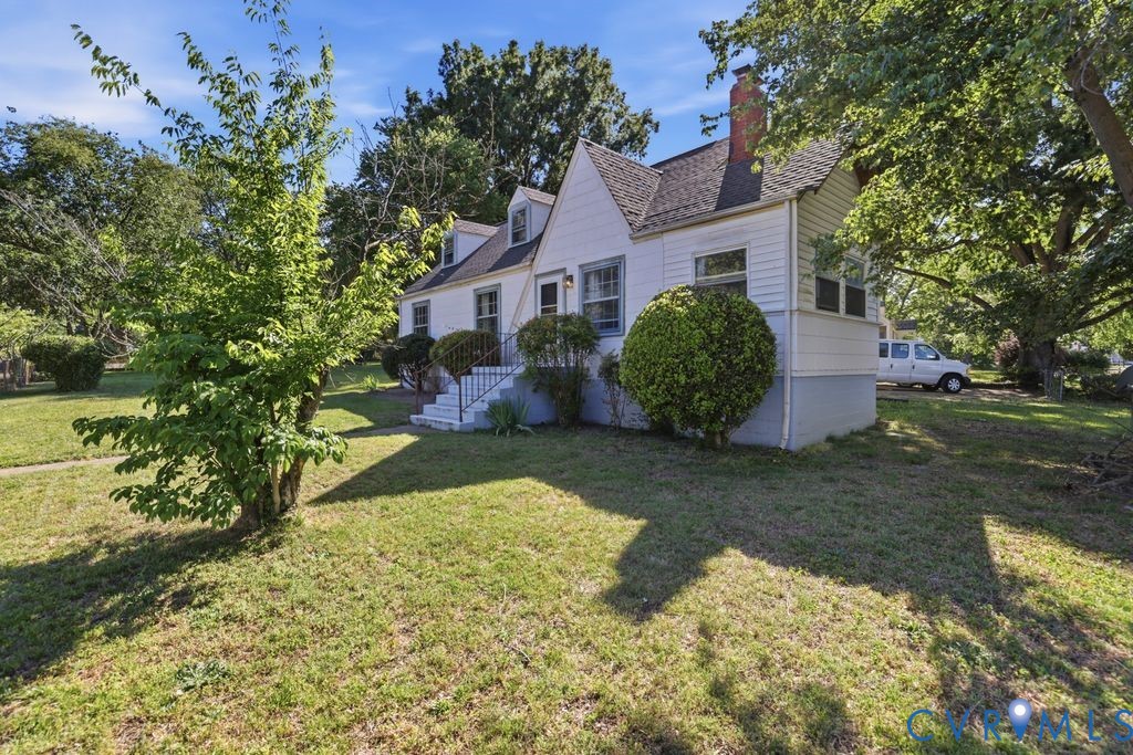 3200 Manorcrest Road Richmond, VA 23234 - Photo 2 of 34 a view of a house with a yard