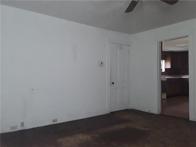 3300 Old Spring Road Ardara, PA 15615 - Photo 7 of 24 Living room with view into the kitchen.
