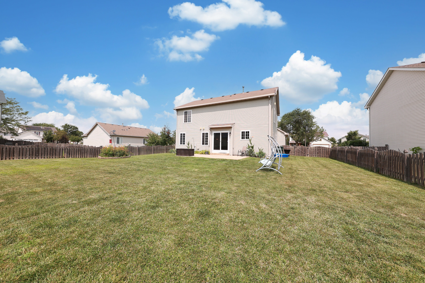1468 Sedge Pass Minooka, IL 60447 - Photo 18 of 19 a house view with a garden space