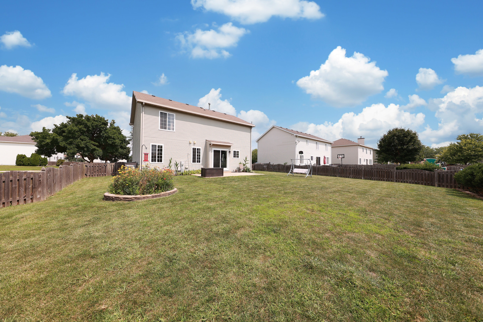 1468 Sedge Pass Minooka, IL 60447 - Photo 19 of 19 a view of a house with backyard and sitting area