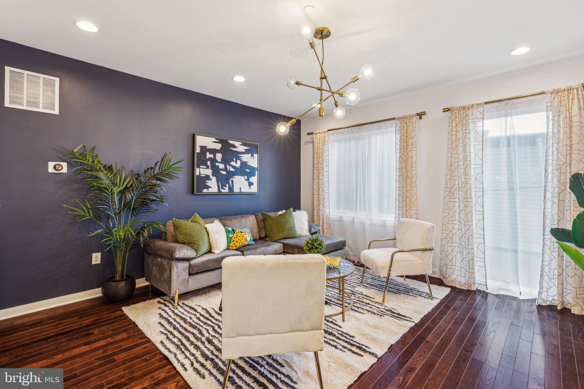 159 East Allen Street, Unit 2 Philadelphia, PA 19125 - Photo 5 of 35 a living room with furniture and wooden floor