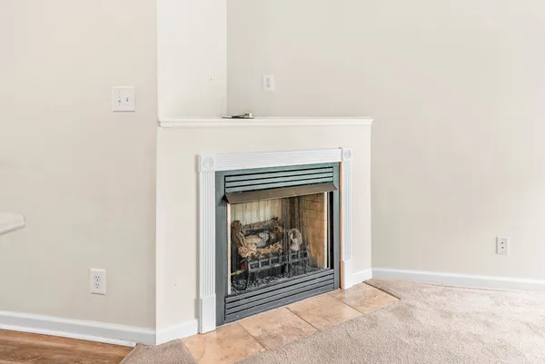 a view of a livingroom with a fireplace