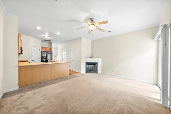 a view of kitchen with sink and cabinet
