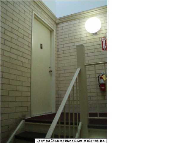 14 Windham Loop, Unit 3B Staten Island, NY 10314 - Photo 3 of 6 a picture of door of a building