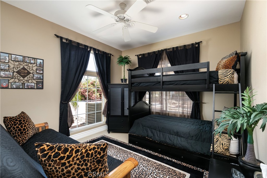 7899 Rio Vista Drive Big River, CA 92242 - Photo 16 of 74 a living room with furniture and a window
