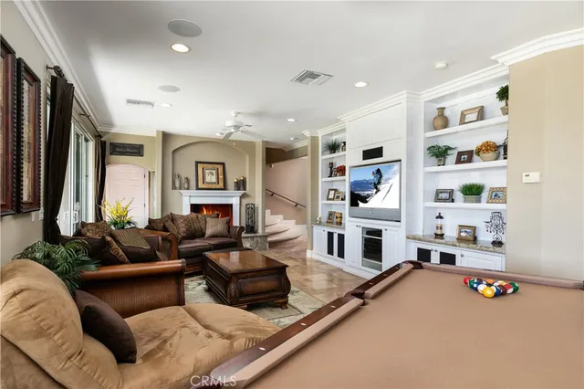 a view of a lake with a table and chairs