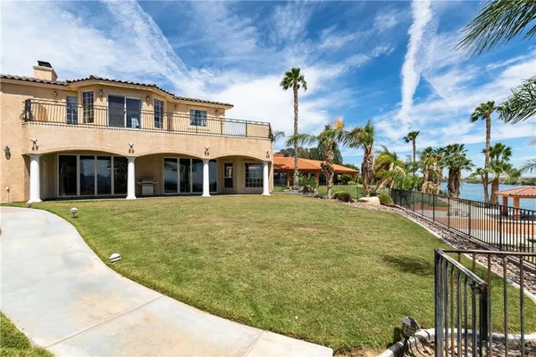a bedroom with a bed and a fireplace