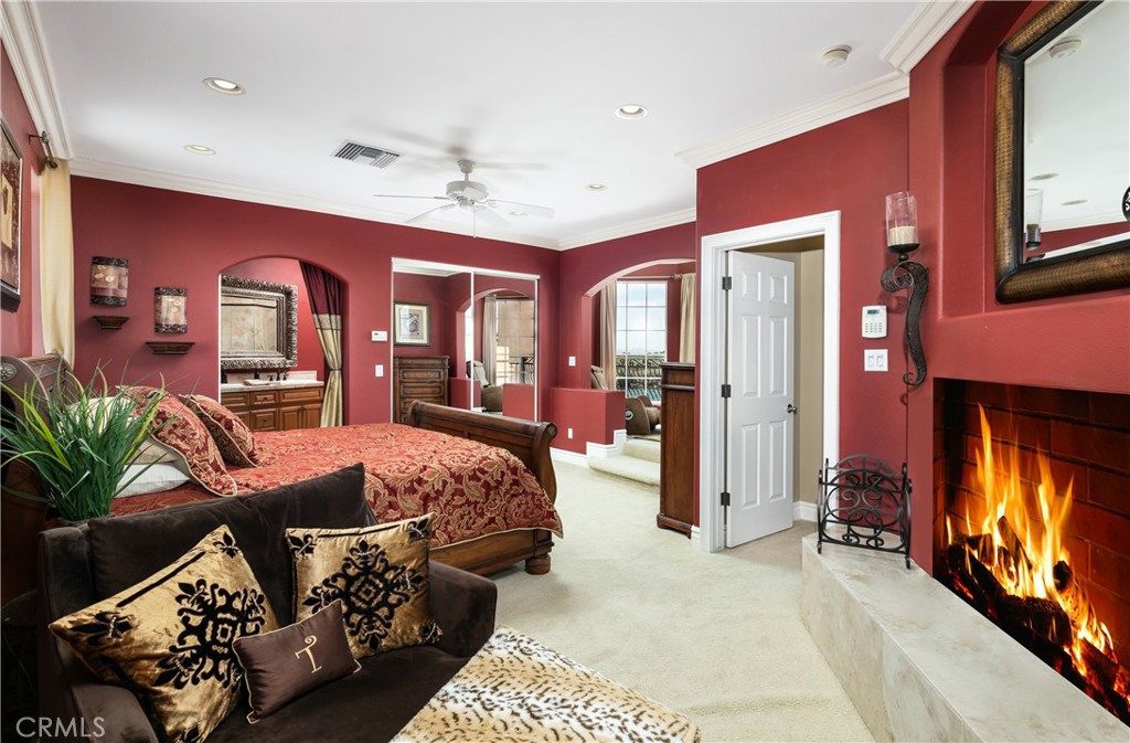 7899 Rio Vista Drive Big River, CA 92242 - Photo 6 of 74 a bed room with furniture and a flat screen tv