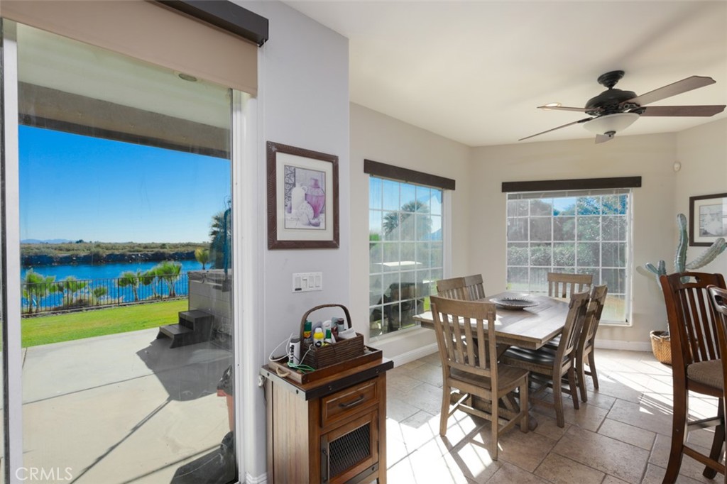 7899 Rio Vista Drive Big River, CA 92242 - Photo 61 of 74 a dining room with furniture and a garden view
