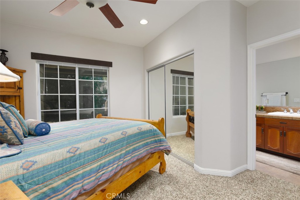 7899 Rio Vista Drive Big River, CA 92242 - Photo 73 of 74 a bedroom with a bed and a large window