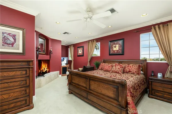 a view of a lake with couches and city view