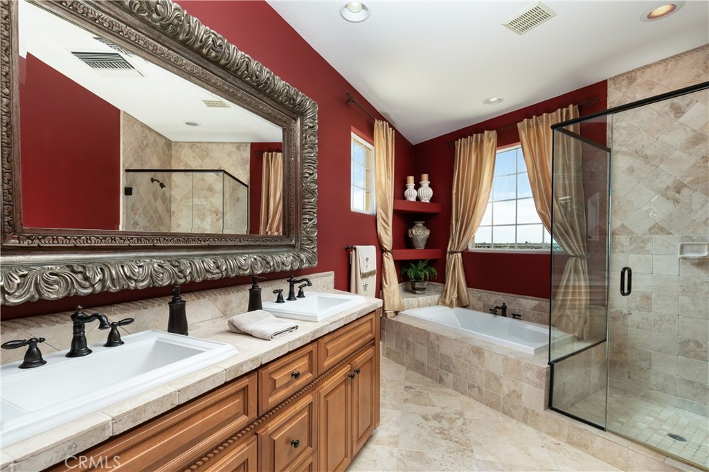 7899 Rio Vista Drive Big River, CA 92242 - Photo 9 of 74 a bathroom with a double vanity sink mirror and double