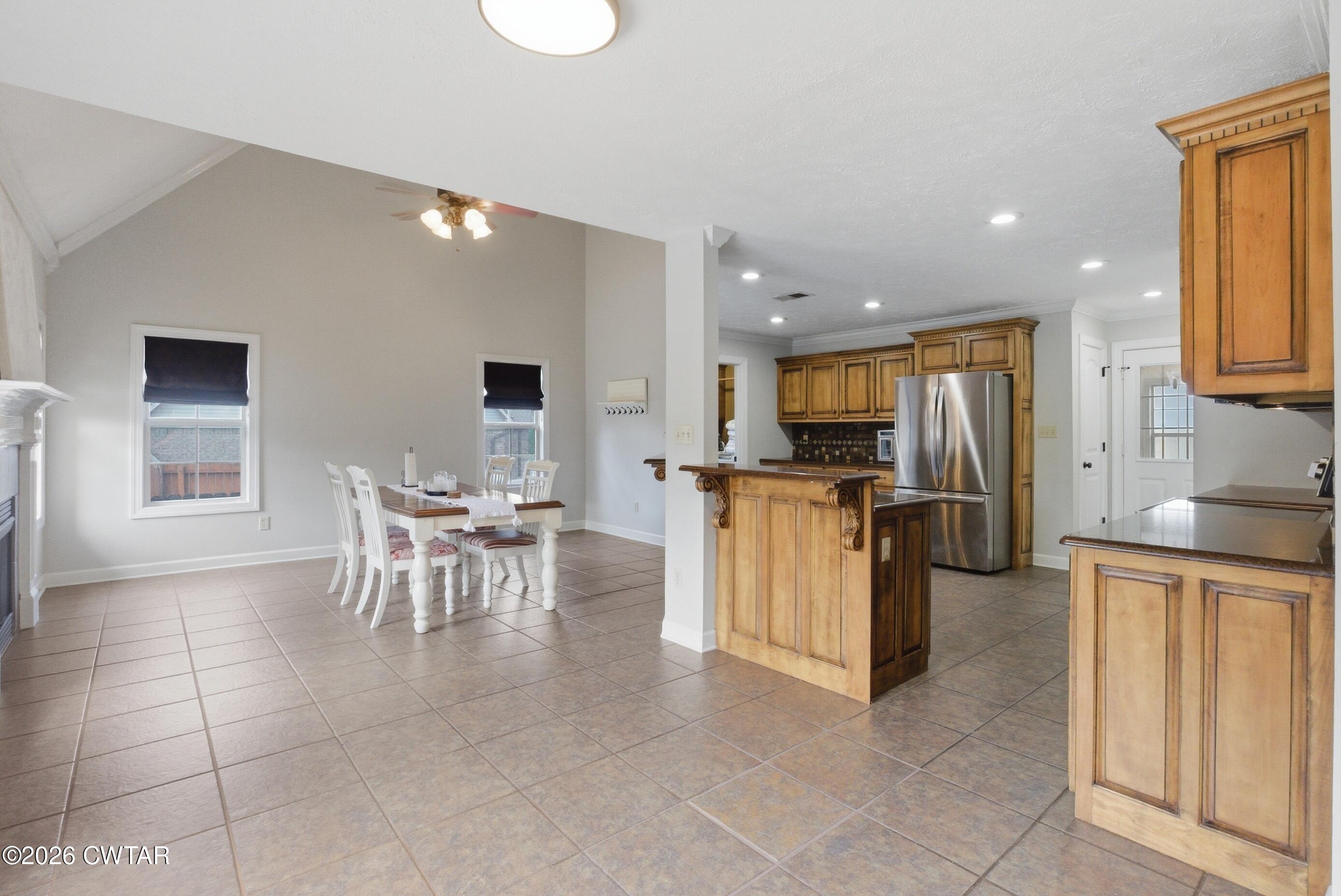 325 Harvest Ridge Lane Medina, TN 38355 - Photo 11 of 43 a open kitchen with cabinets and stainless steel appliances