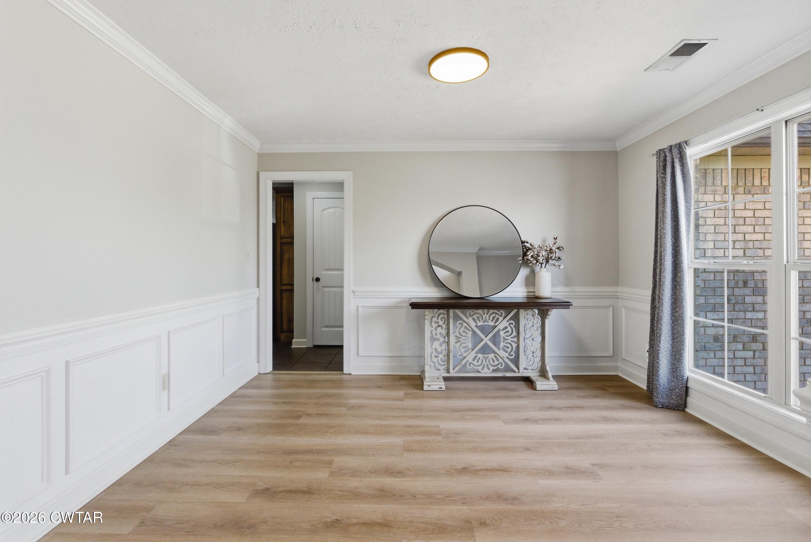 325 Harvest Ridge Lane Medina, TN 38355 - Photo 15 of 43 a view of a room with wooden floor and a window