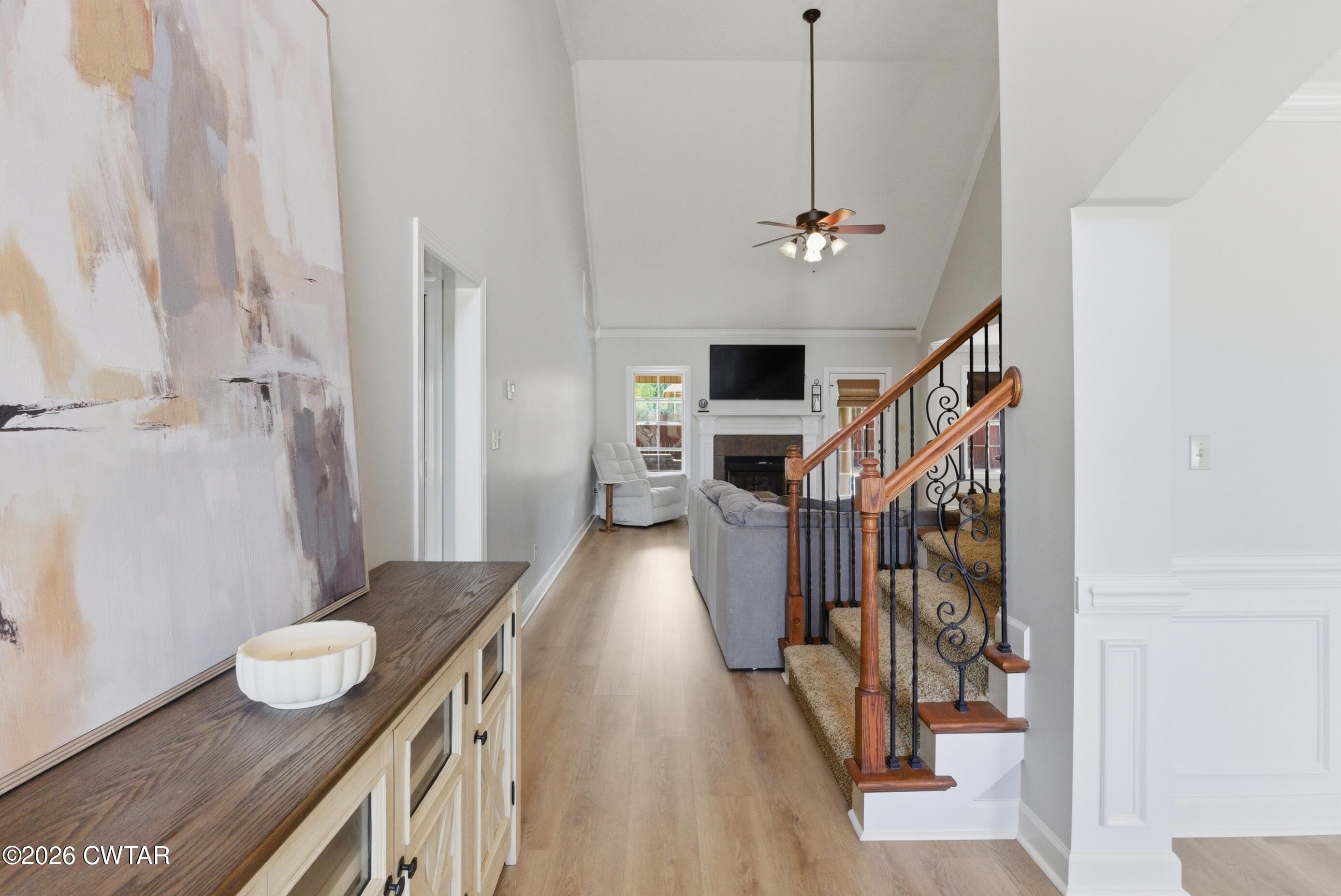 325 Harvest Ridge Lane Medina, TN 38355 - Photo 19 of 43 a view of a hallway with furniture and wooden floor