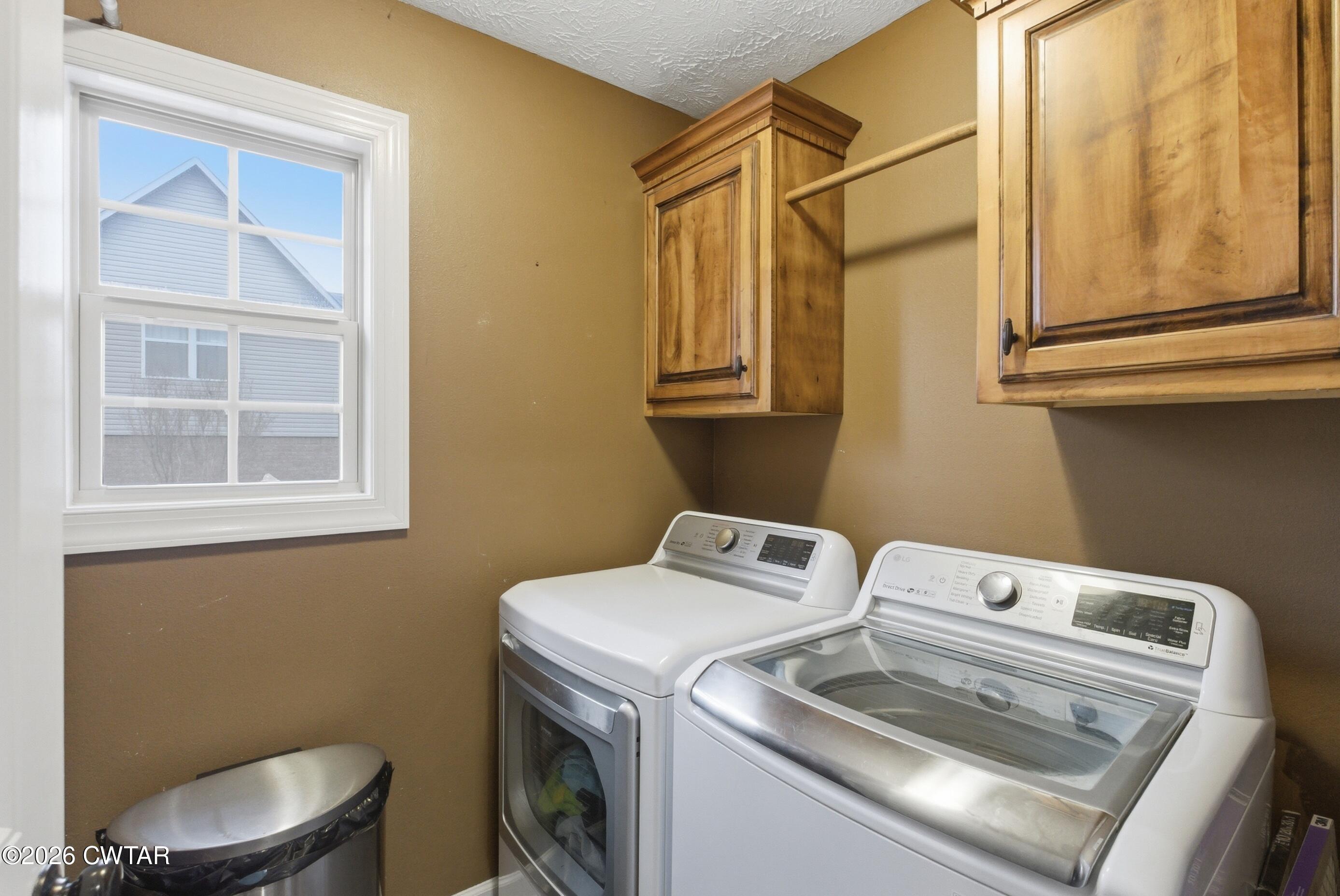 325 Harvest Ridge Lane Medina, TN 38355 - Photo 21 of 43 a utility room with dryer and washer