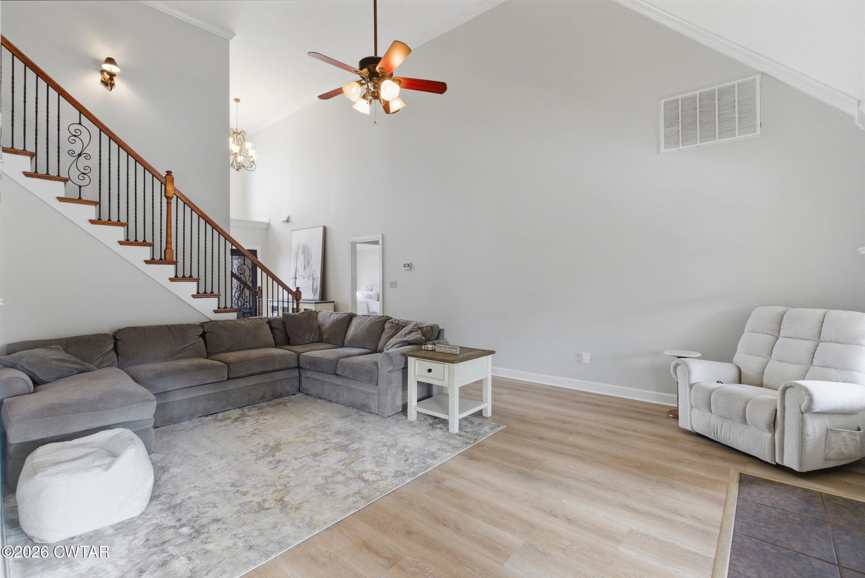 325 Harvest Ridge Lane Medina, TN 38355 - Photo 24 of 43 a living room with furniture and a wooden floor