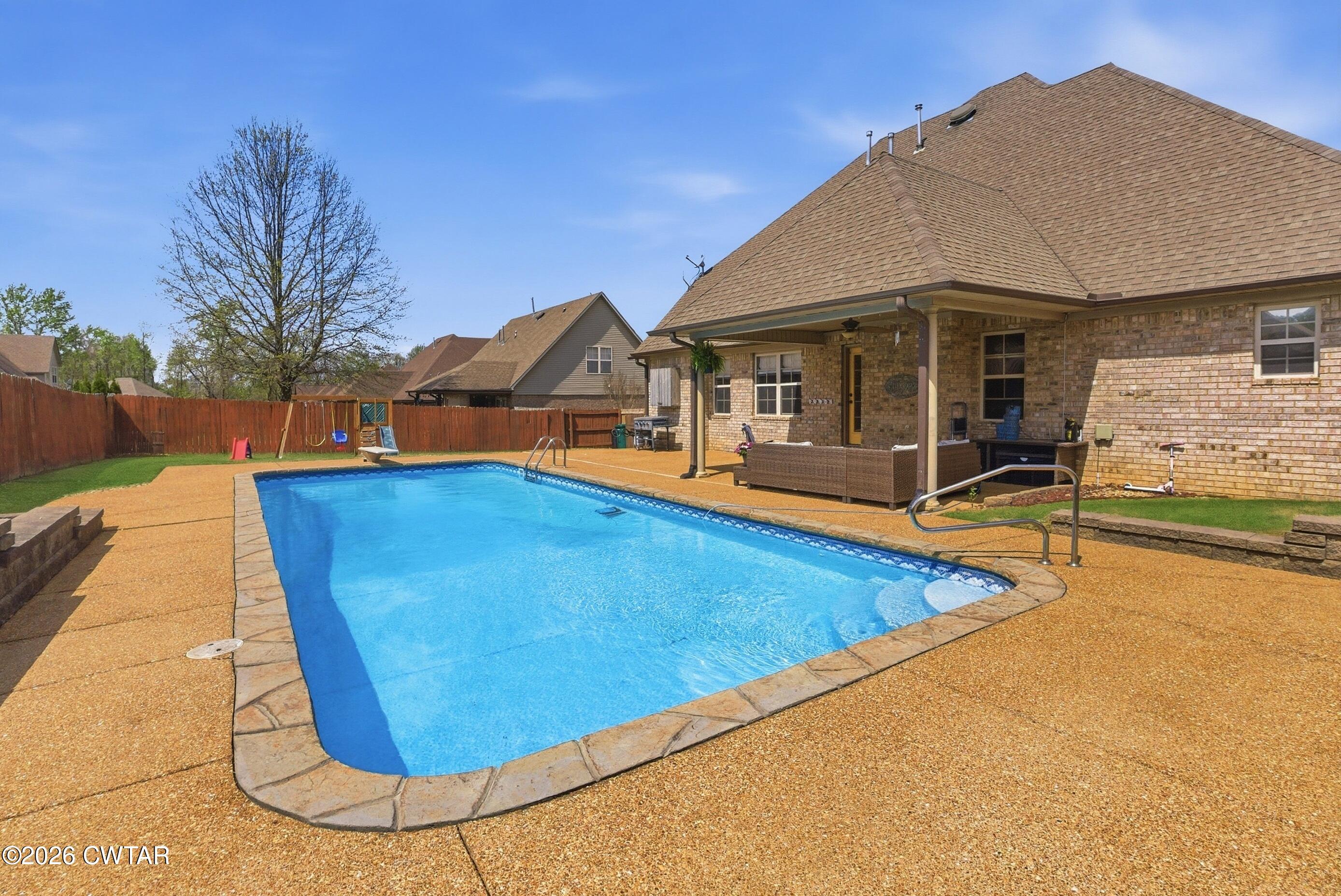 325 Harvest Ridge Lane Medina, TN 38355 - Photo 37 of 43 a view of a house with swimming pool