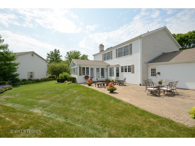 976 West Bauer Road Naperville, IL 60563 - Photo 21 of 21 a view of a house with backyard and sitting area