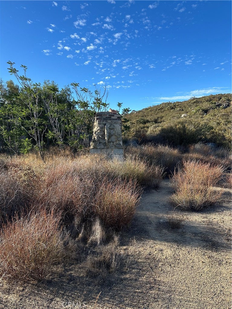 0 Minto Way Hemet, CA 92544 - Photo 18 of 19 a view of a yard with wooden fence