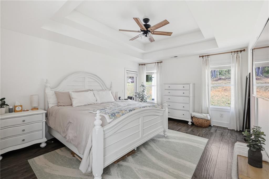 164 Mary Saphire Road Dawsonville, GA 30534 - Photo 12 of 25 a bedroom with a bed and a dresser