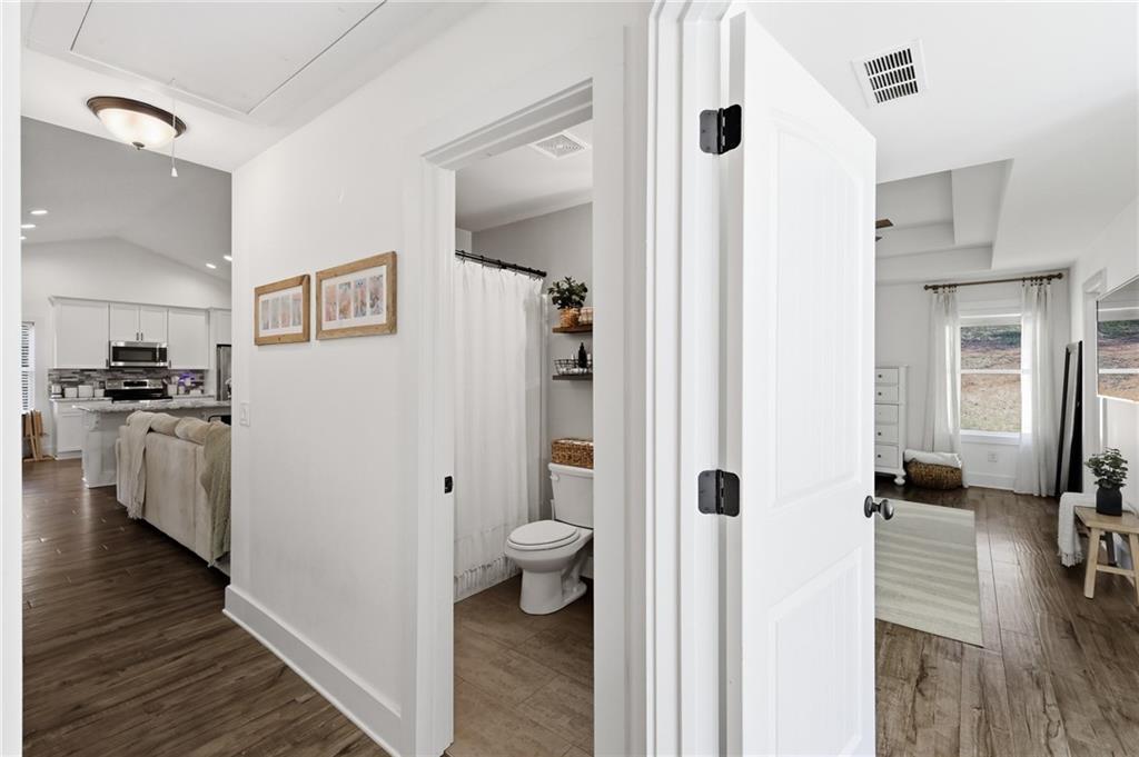 164 Mary Saphire Road Dawsonville, GA 30534 - Photo 19 of 25 a view of bathroom with a tub and a view of bathroom