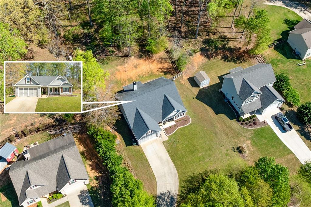 164 Mary Saphire Road Dawsonville, GA 30534 - Photo 24 of 25 an aerial view of residential house with outdoor space and swimming pool