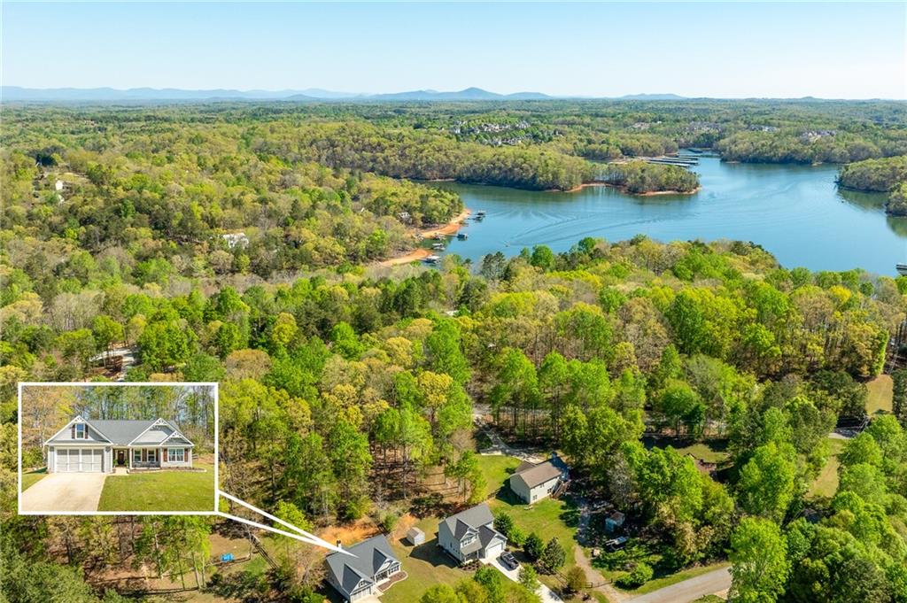164 Mary Saphire Road Dawsonville, GA 30534 - Photo 25 of 25 an aerial view of residential houses with outdoor space