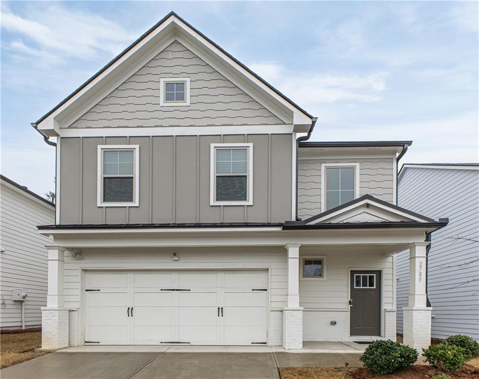 a view of a house with large windows
