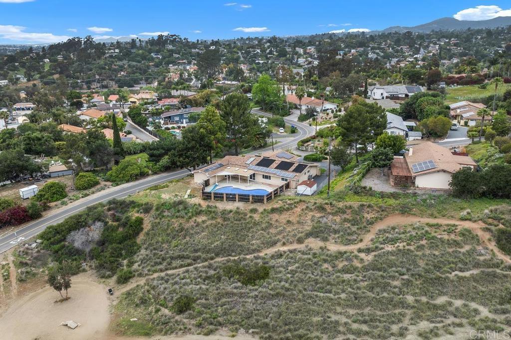 1277 Cypress Drive Vista, CA 92084 - Photo 3 of 18 an aerial view of a house with a yard