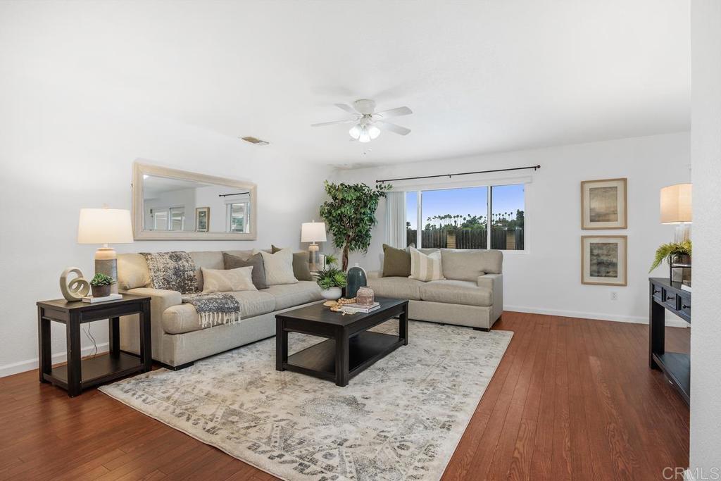 1277 Cypress Drive Vista, CA 92084 - Photo 10 of 18 a living room with furniture and a couch