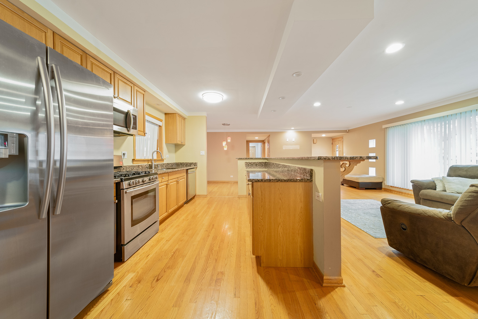 Undisclosed Address Chicago, IL 60634 - Photo 11 of 23 a kitchen with stainless steel appliances granite countertop a refrigerator a stove and a refrigerator
