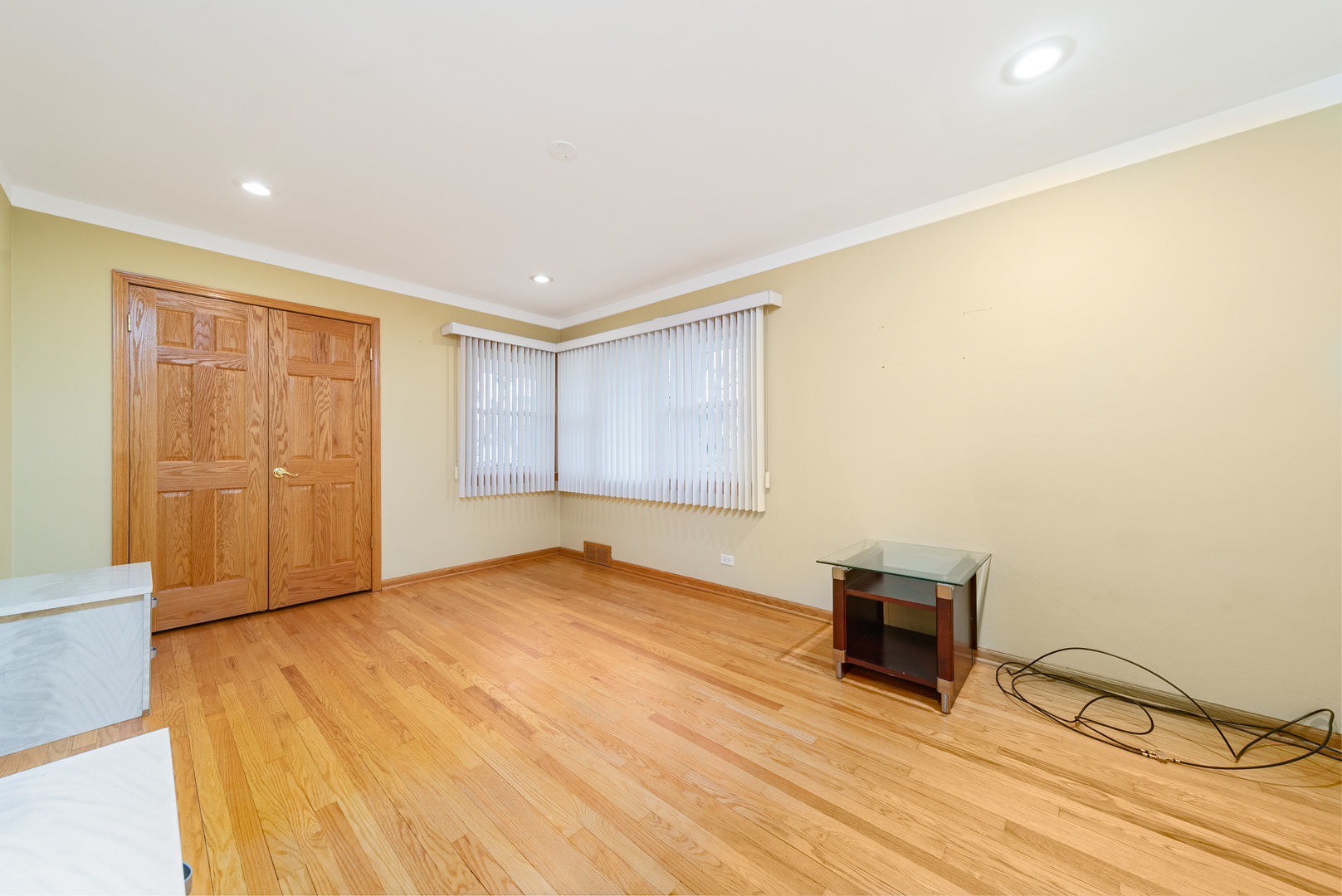 Undisclosed Address Chicago, IL 60634 - Photo 12 of 23 a view of an empty room with wooden floor and a window