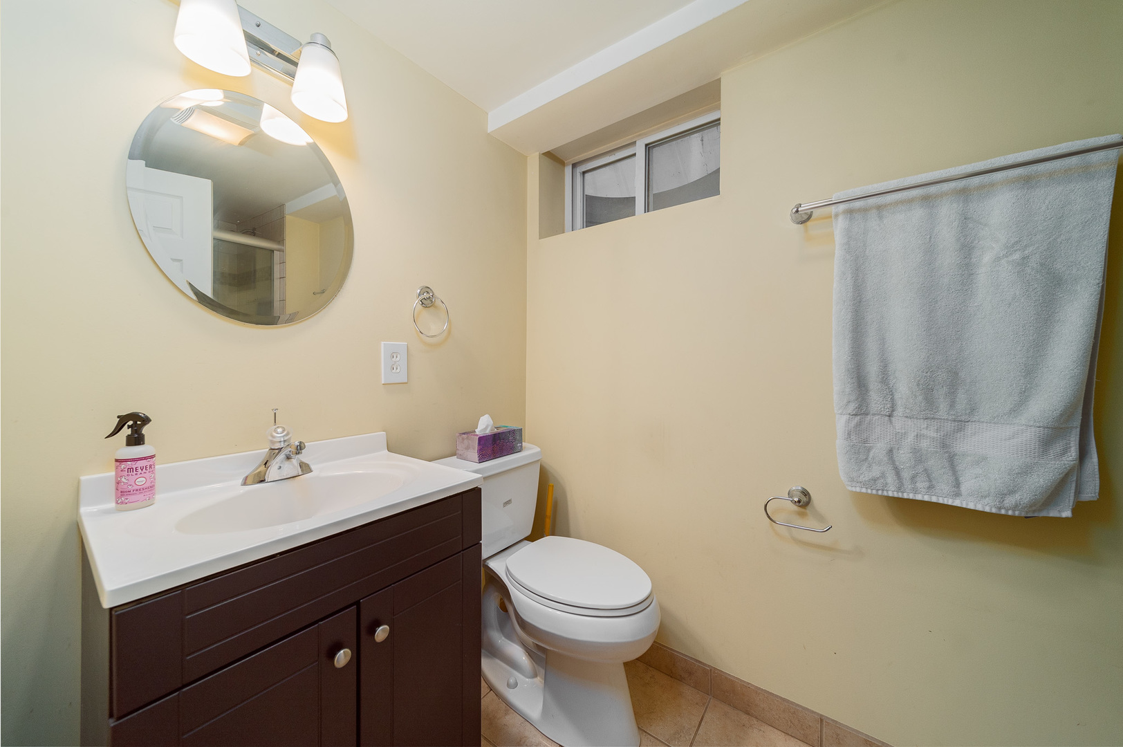 Undisclosed Address Chicago, IL 60634 - Photo 20 of 23 a bathroom with a sink vanity mirror and toilet