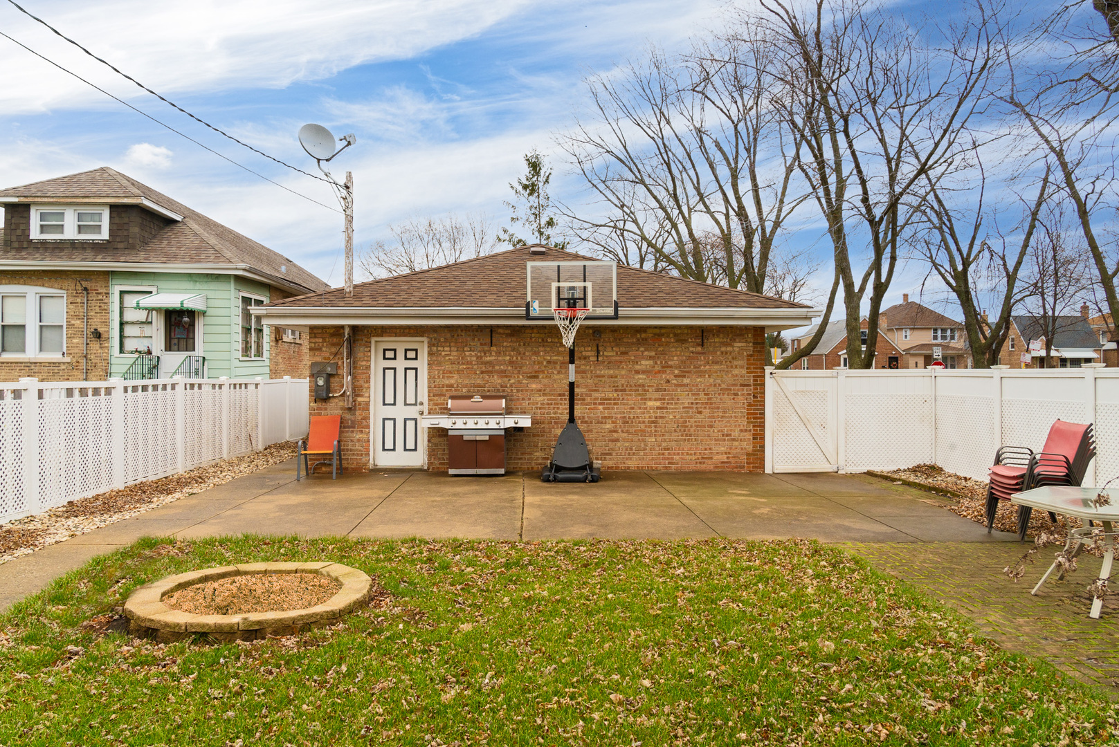 Undisclosed Address Chicago, IL 60634 - Photo 23 of 23 a front view of a house with a yard garage and a tub
