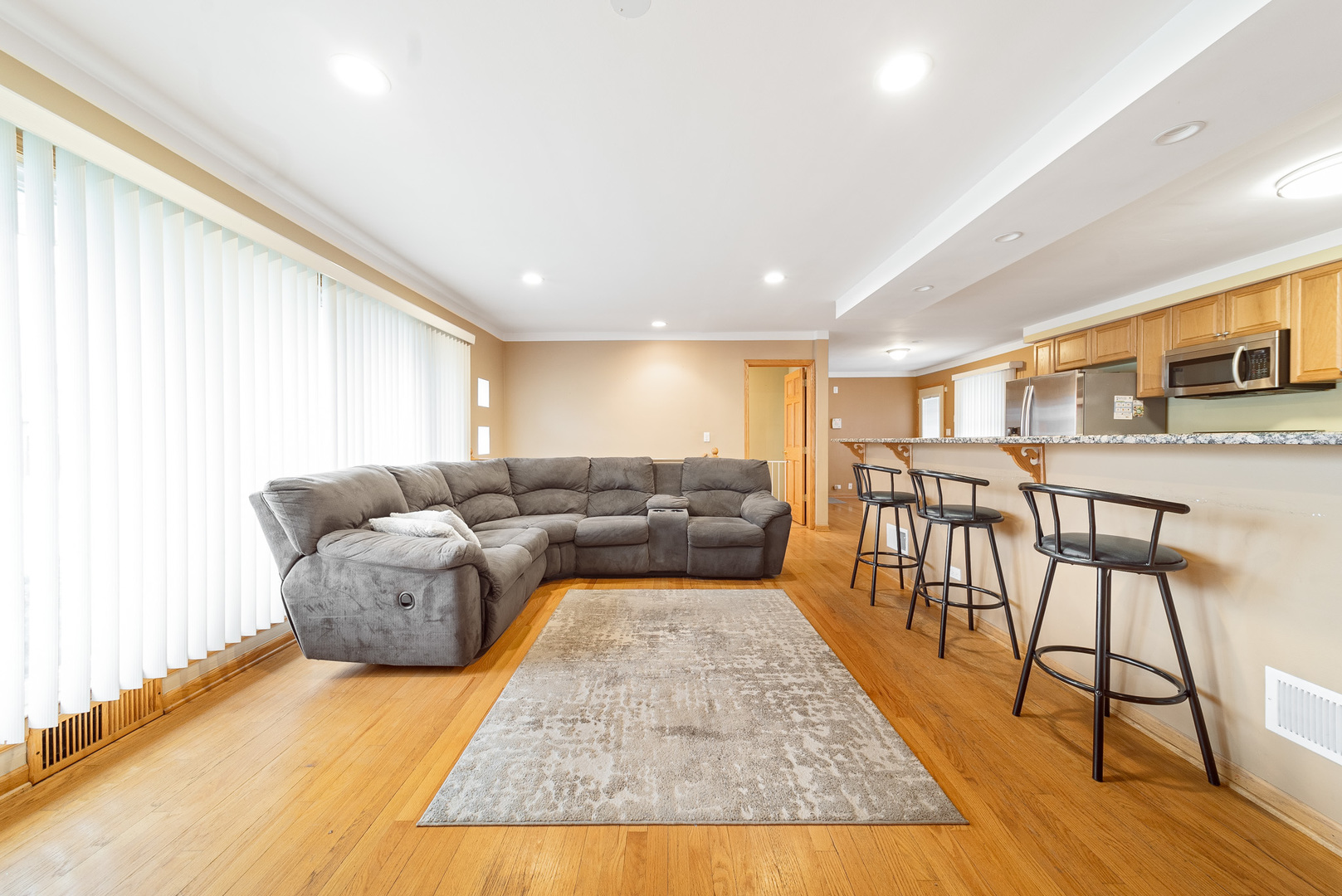 Undisclosed Address Chicago, IL 60634 - Photo 5 of 23 a living room with furniture wooden floor and a table