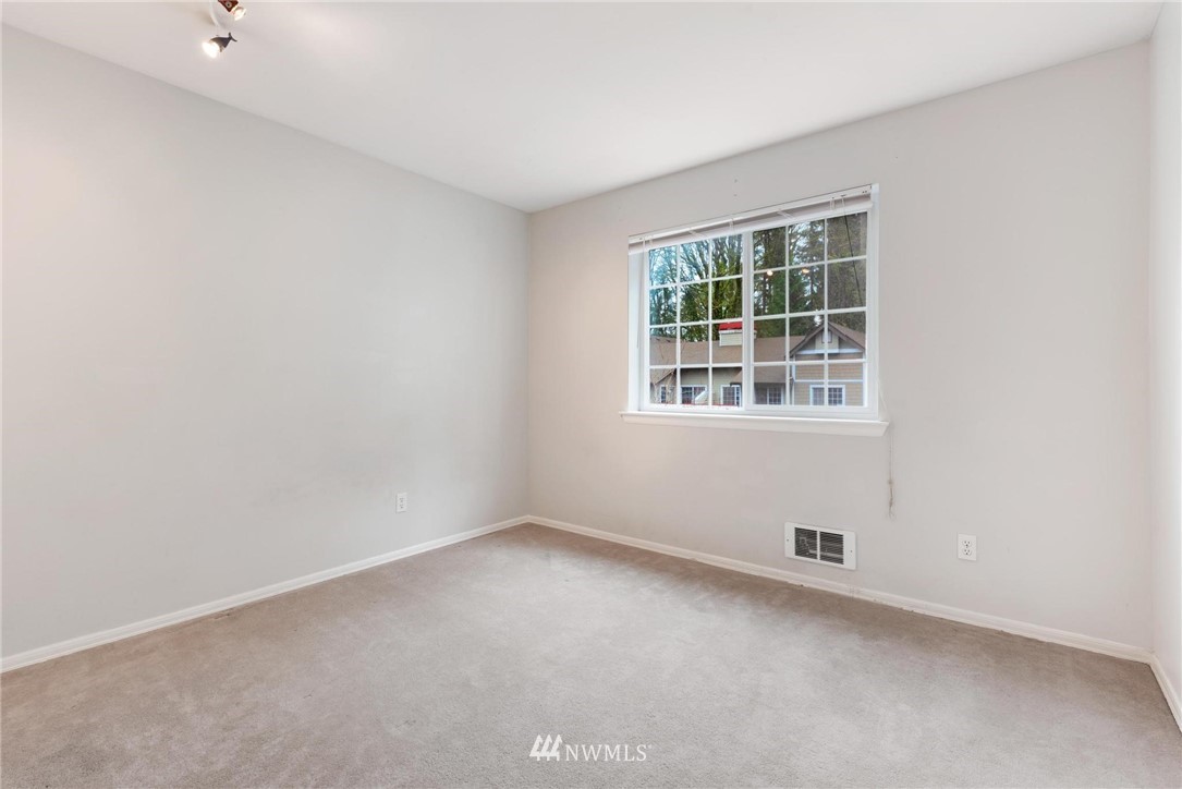 18505 Southeast Newport Way, Unit E320 Issaquah, WA 98027 - Photo 11 of 18 an empty room with a window