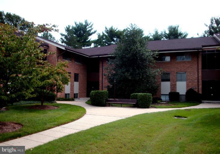 18709 Walkers Choice Road, Unit 6 Gaithersburg, MD 20886 - Photo 10 of 10 a view of a house with a yard