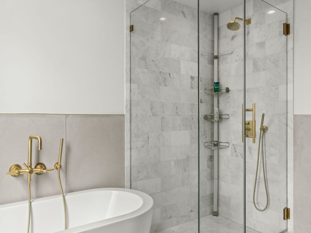 70 Rainey Street, Unit 2301 Austin, TX 78701 - Photo 27 of 40 a bathroom with a sink and a shower