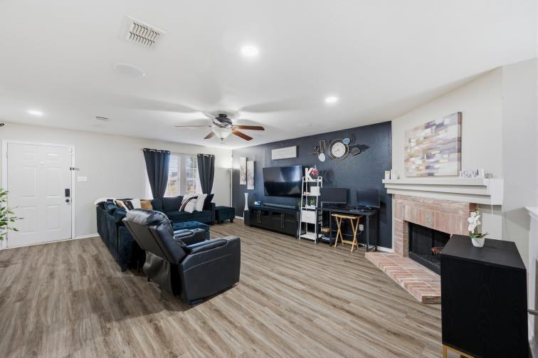 8721 Hunters Point Way Fort Worth, TX 76123 - Photo 9 of 25 Laminate plank flooring