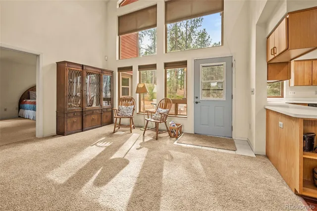 a view of a bedroom with a large window